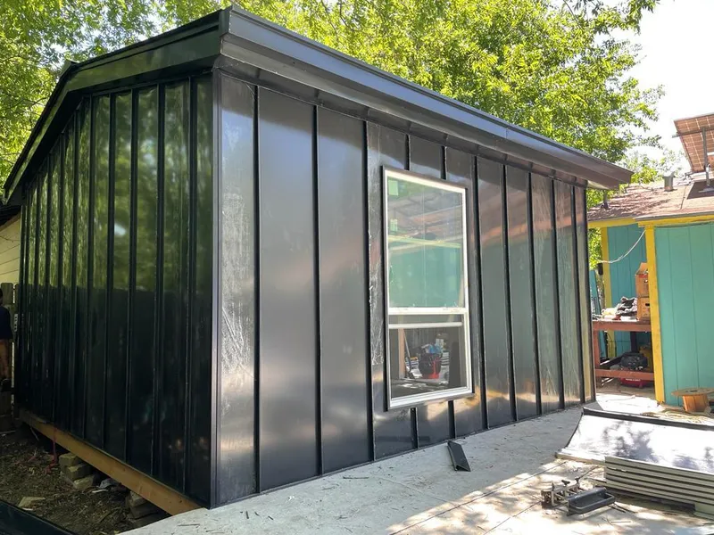 Black standing seam metal wall panels for Metal Roof Installation in Orland