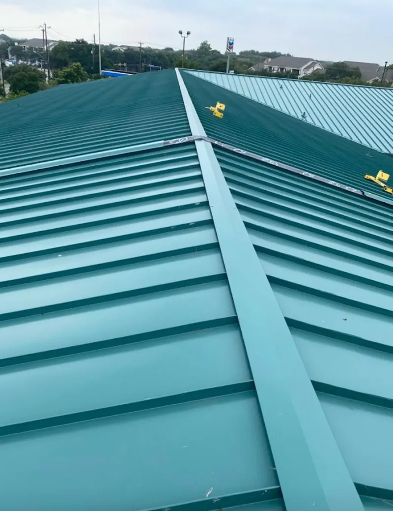 Green commercial metal roof ridge and valley for Metal Roof Repair in Orland