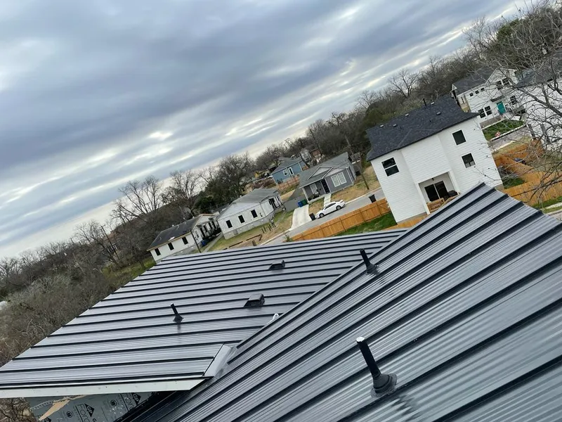 Standing seam metal roof panels with vents for Skylight Repair in Orland